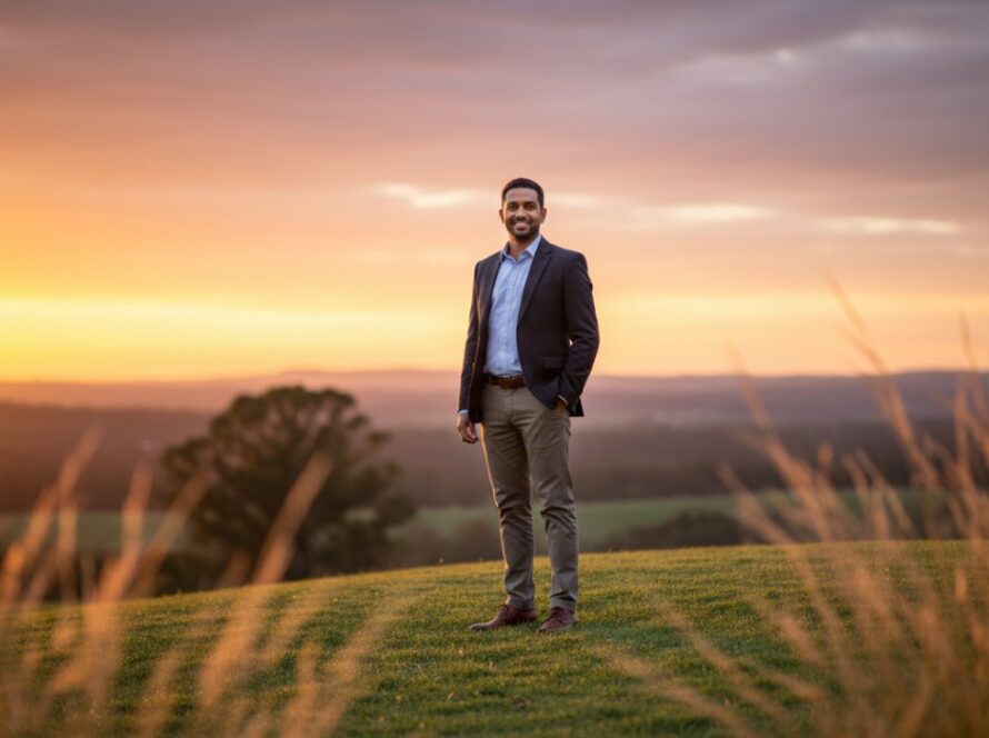 A confident Avonsleigh local professional, mid-stride through the scenic Avonsleigh General Store area, captured in a dynamic, sunlit Avonsleigh corporate headshot for local professionals, conveying success and approachability.
