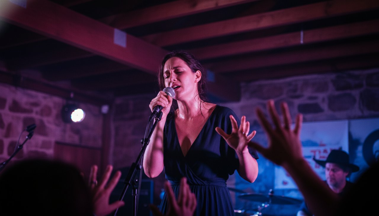 An electrifying close-up shot of a lead guitarist mid-solo on stage at a vibrant Bittern music venue, bathed in dynamic stage lights, perfectly encapsulating Bittern live music photography capturing raw energy.