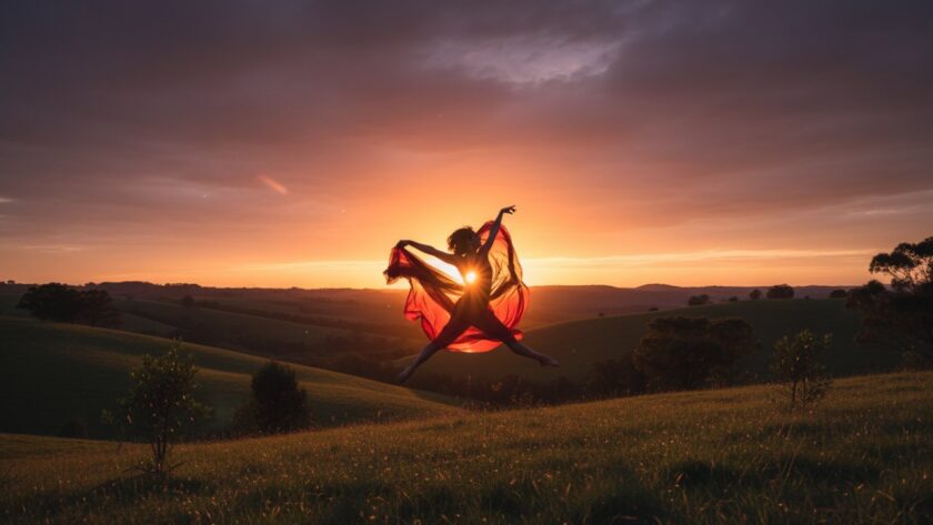 A powerful female dancer in mid-air, bathed in golden hour light against the natural backdrop of Launching, Victoria, showcasing a perfect example of capturing dynamic dance photography Launching Victoria.