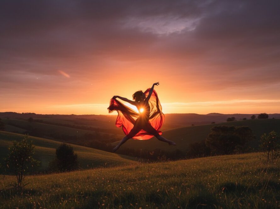 A powerful female dancer in mid-air, bathed in golden hour light against the natural backdrop of Launching, Victoria, showcasing a perfect example of capturing dynamic dance photography Launching Victoria.