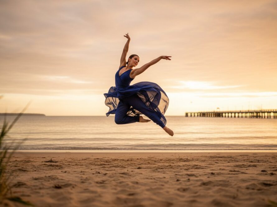 An epic moment of a dancer mid-air, silhouetted against a golden Safety Beach sunset, performing a powerful contemporary leap, perfectly illustrating Capturing Dynamic Dance Photography Safety Beach.