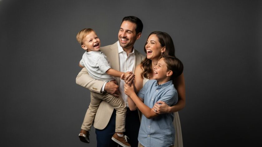 A heartwarming and dynamic Launching Victoria Family Studio Portraits scene, with a family laughing joyfully amidst soft, artistic lighting, capturing a truly epic moment of connection and love.