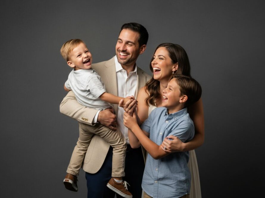 A heartwarming and dynamic Launching Victoria Family Studio Portraits scene, with a family laughing joyfully amidst soft, artistic lighting, capturing a truly epic moment of connection and love.