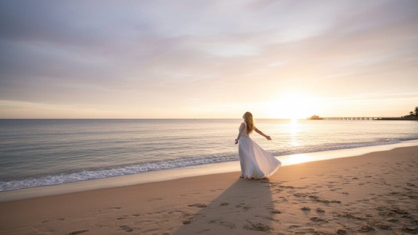 A breathtaking golden hour landscape of Safety Beach, Victoria, showcasing the tranquil coastline and vibrant sunset hues, perfectly exemplifying Safety Beach fine art photography capturing coastal serenity, with a solitary figure silhouetted against the horizon.