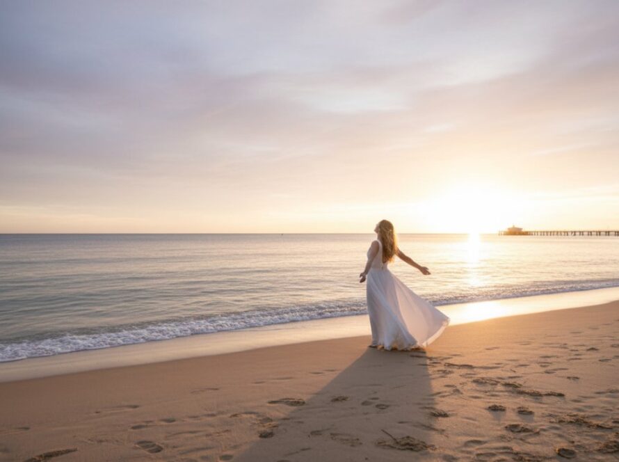 A breathtaking golden hour landscape of Safety Beach, Victoria, showcasing the tranquil coastline and vibrant sunset hues, perfectly exemplifying Safety Beach fine art photography capturing coastal serenity, with a solitary figure silhouetted against the horizon.