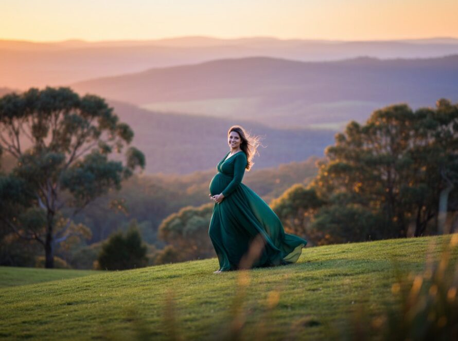 An expectant mother in a flowing gown, bathed in the soft, golden light of a Tecoma maternity photography outdoor autumn glow, standing gracefully amidst native Australian flora, capturing an epic, serene moment.