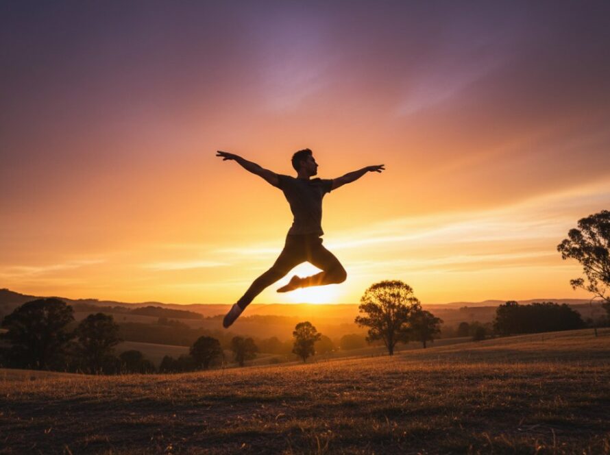 A male ballet dancer leaping gracefully against the stunning natural backdrop of Woori Yallock, showcasing Woori Yallock dynamic dance photography with dramatic golden hour lighting.