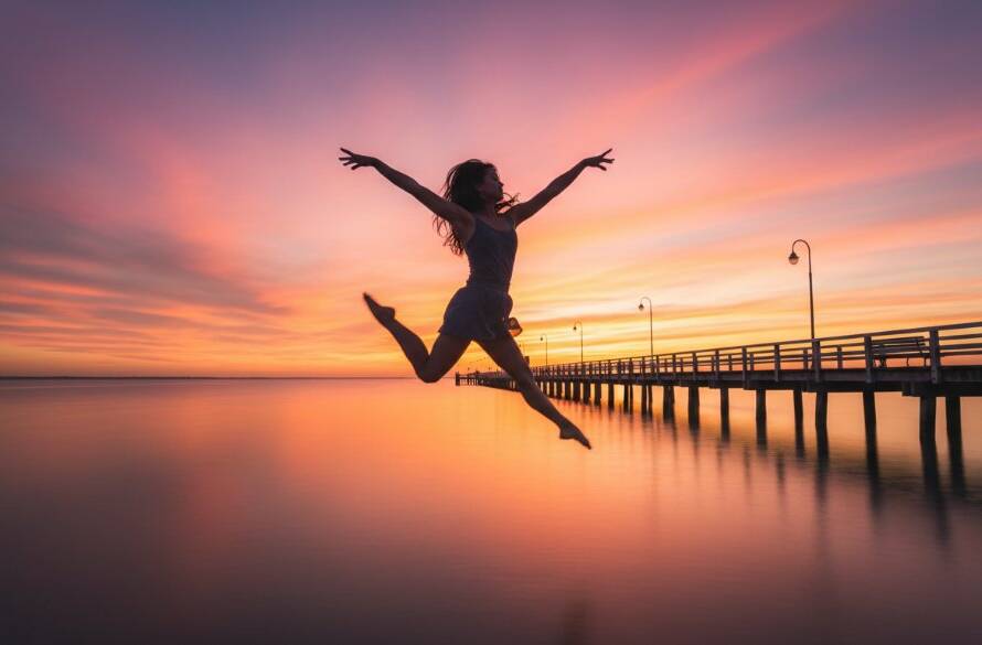 An exquisite wide shot of a contemporary dancer performing an elegant leap on Altona pier at sunset, dramatically lit, capturing the breathtaking beauty of Altona pier sunset contemporary dance photography.