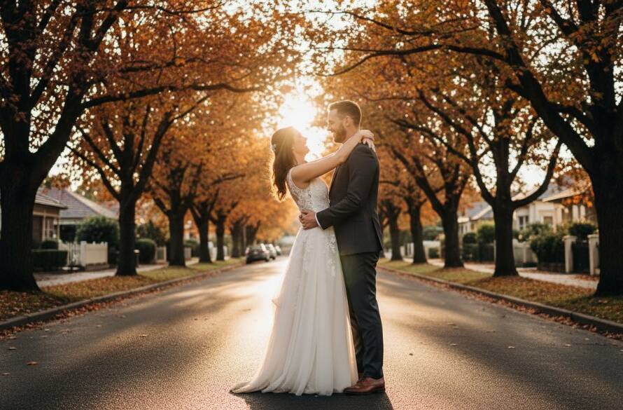 Authentic Ashburton Wedding Photography Capturing Love Stories: A dramatic, high-angle shot of a newlywed couple embracing passionately under a canopy of autumnal trees at Warner Reserve, Ashburton, with golden hour light silhouetting them against the warm glow, conveying joy and intimacy.