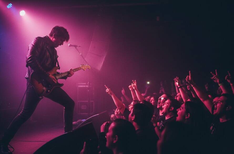 A wide shot capturing an epic moment of a lead singer bathed in dramatic stage lighting, performing passionately at a vibrant live music venue in Bayswater, Victoria, Australia, showcasing professional Bayswater Victoria live music photography.