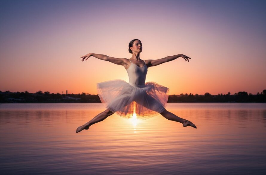 A dramatic, professionally lit photograph of a dancer mid-leap at sunset over Lake Benalla, showcasing Benalla dance photography capturing soulful movement and the raw emotion of performance.