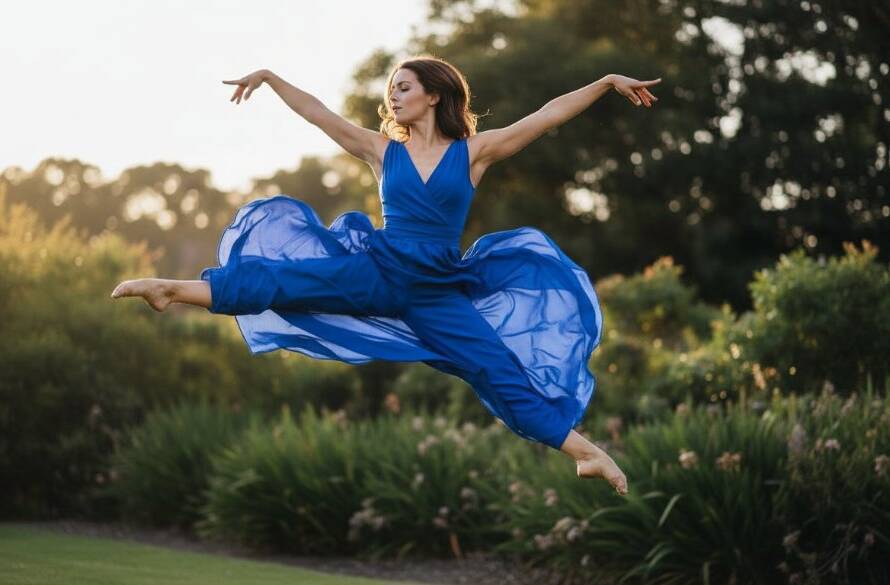 A Box Hill North dance photography specialists' epic shot of a dancer mid-air, bathed in dramatic theatrical lighting, capturing powerful grace and vibrant movement against a blurred urban Box Hill North backdrop, showcasing professional colour grading.