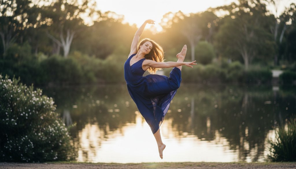 A female contemporary dancer in mid-air, performing an acrobatic leap against a softly blurred natural backdrop at Wilson Botanic Park, Narre Warren South, dramatically lit by golden hour sun, showcasing the capturing dance artistry Narre Warren South Victoria.