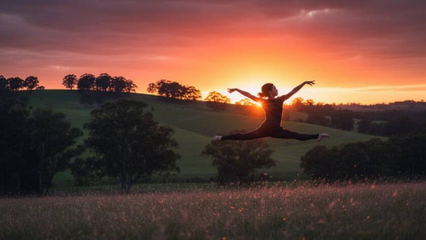 An energetic dancer captured mid-leap with a vibrant sunset backdrop over the Croydon Hills landscape, perfectly illustrating capturing dynamic dance moments Croydon Hills with dramatic lighting and professional colour grading.
