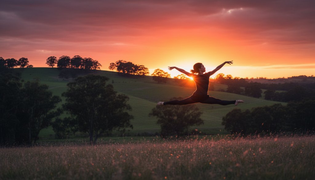 An energetic dancer captured mid-leap with a vibrant sunset backdrop over the Croydon Hills landscape, perfectly illustrating capturing dynamic dance moments Croydon Hills with dramatic lighting and professional colour grading.