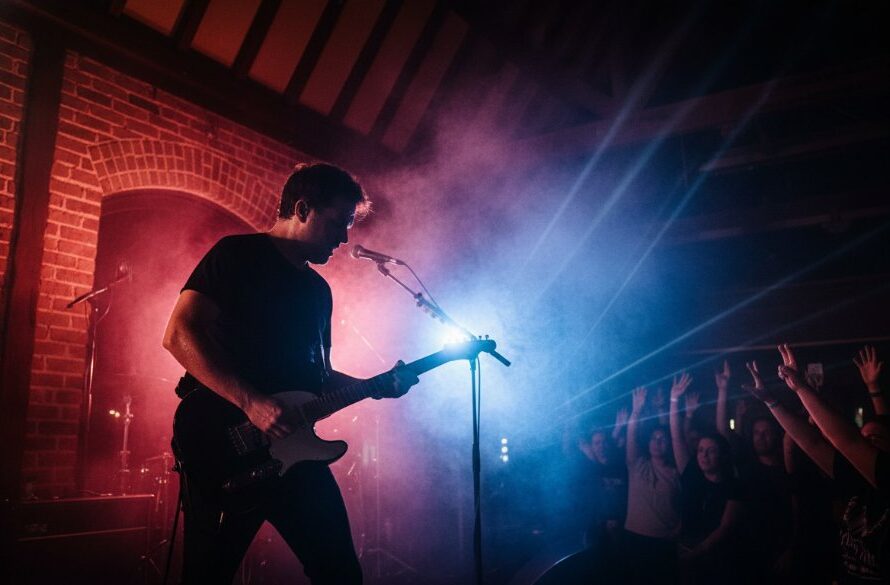 An epic moment of a lead singer silhouetted against vibrant stage lights, capturing electrifying live music Soldiers Hill Victoria, showcasing dynamic concert photography.