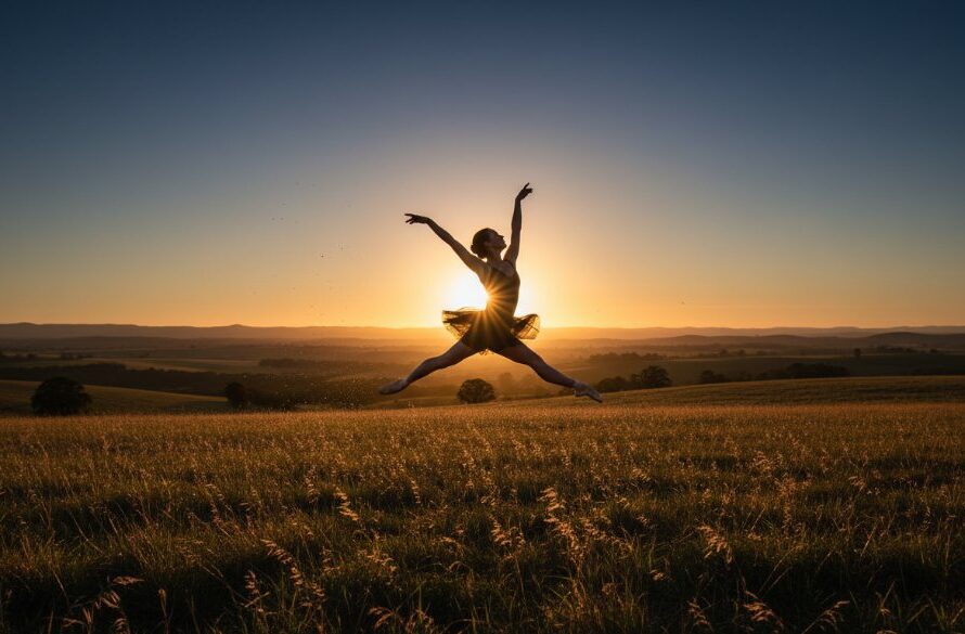 An elegant dancer in a dramatic leap, silhouetted against a golden sunset over the Gisborne hills, perfectly illustrating capturing Gisborne dance photography elegance with artistic flair.