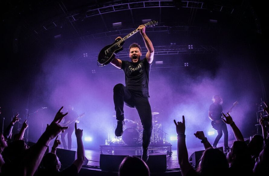 A dynamic, wide-angle shot of a guitarist mid-shred on a brightly lit stage at a Gisborne music venue, with the crowd's hands raised in the foreground, perfectly capturing Gisborne live music energy and an epic concert moment.