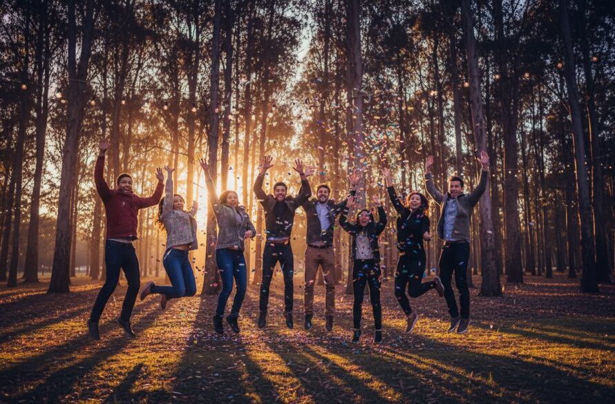 An epic moment of pure joy, professionally captured at a lively Waurn Ponds party, showcasing friends laughing and dancing under twinkling lights, exemplifying vibrant Waurn Ponds party photography.