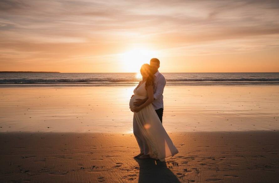 A breathtaking Carrum Beach golden hour maternity photoshoot moment featuring a pregnant woman silhouetted against a dramatic sunset over Port Phillip Bay, her partner gently embracing her, capturing a serene and epic landscape portrait.