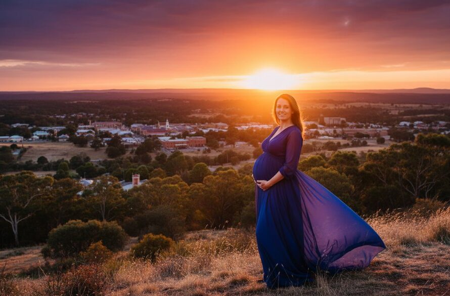 An epic moment: A pregnant woman silhouetted against a dramatic Castlemaine sunset, captured in breathtaking Castlemaine maternity photography sunset portraits, evoking warmth and anticipation.