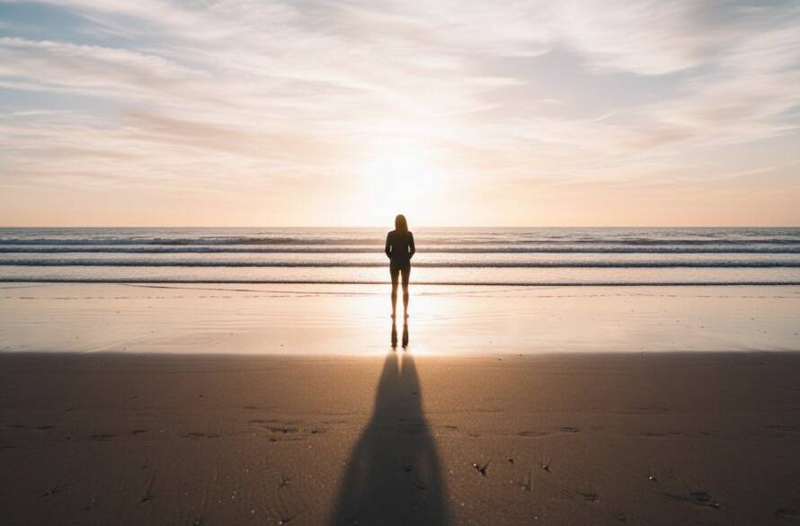 An epic, dramatically lit photograph showcasing Chelsea Heights Fine Art Photography Coastal Serenity, with a lone figure silhouetted against a vibrant sunset over the tranquil Port Phillip Bay waters, professional color grading enhancing the serene, artistic mood.