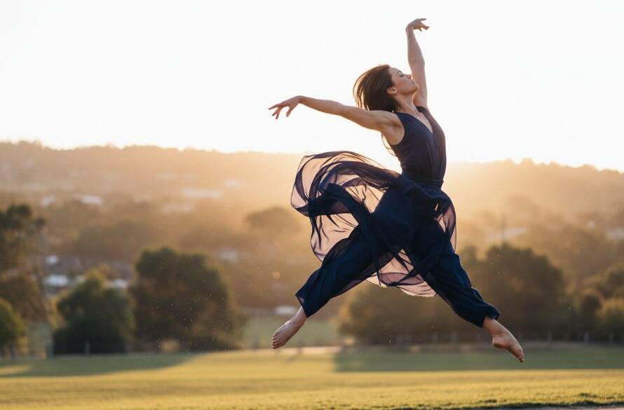 A dynamic, epic moment photograph capturing a contemporary dancer in full flight, mid-leap, silhouetted against a dramatic Rowville sunset, showcasing Contemporary Dance Photography Rowville Storytelling with professional lighting and vibrant motion.