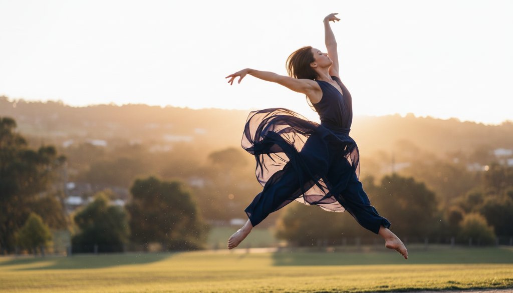 A dynamic, epic moment photograph capturing a contemporary dancer in full flight, mid-leap, silhouetted against a dramatic Rowville sunset, showcasing Contemporary Dance Photography Rowville Storytelling with professional lighting and vibrant motion.