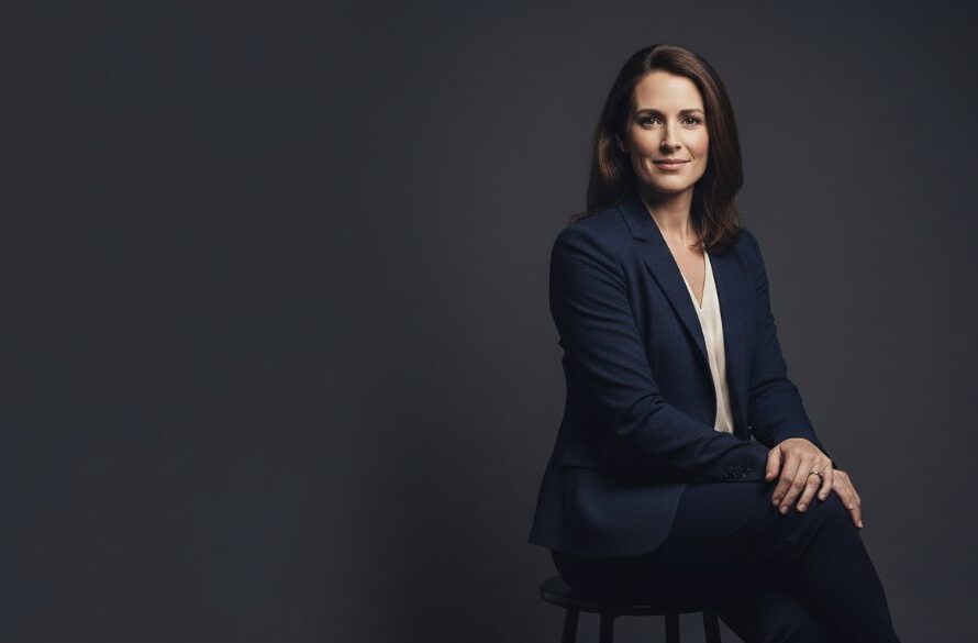 A captivating Daylesford bespoke studio portrait, showcasing a professional woman with a confident smile, dramatic rim lighting highlighting her silhouette against a dark background, evoking a powerful and inspiring epic moment.