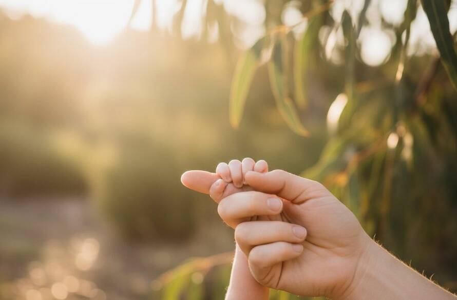 A heartwarming, professionally lit 'epic moment' photograph showcasing Donvale newborn photography capturing natural light moments, with a baby nestled gently in a basket amidst soft morning light in a natural Donvale setting.