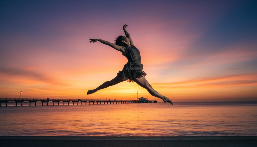 A stunning dynamic dance photography Frankston pier sunset shot, featuring a dancer in mid-air against a vibrant sky, capturing an epic moment of strength and grace.