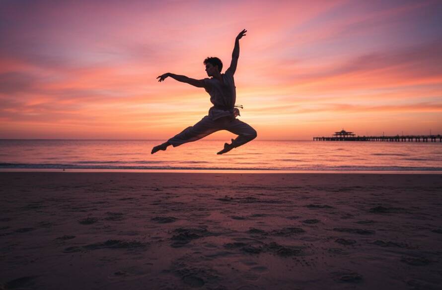 A male dancer captured mid-air in a dramatic leap over the Frankston South foreshore at sunset, showcasing dynamic dance photography Frankston South with powerful lighting and artistic composition.