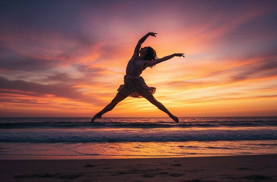 Dynamic dance photography Hampton Victoria capturing a breathtaking leap by a contemporary dancer at sunset on Hampton Beach, showcasing powerful athleticism and grace against a vibrant sky.