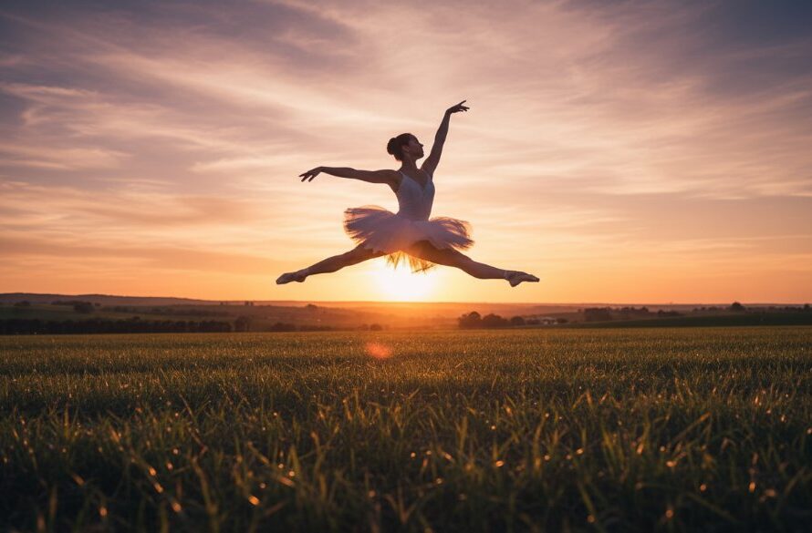A Leongatha ballet dancer mid-leap at golden hour, silhouetted against a panoramic rural landscape, capturing the dynamic dance photography Leongatha capturing emotion with dramatic backlighting and a powerful, graceful pose.