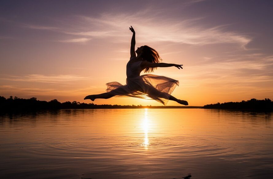 An epic moment captured in dynamic dance photography Merbein Victoria, showing a dancer mid-leap against a sunset backdrop over the Murray River, embodying grace and power with dramatic lighting and professional color grading.