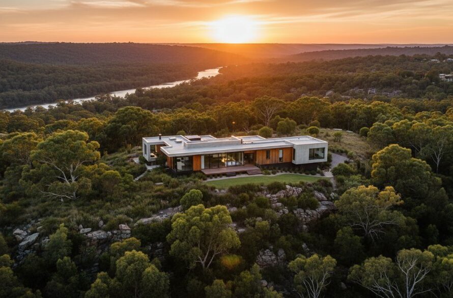 A dramatic aerial shot showcasing a stunning modern home nestled against the lush, rolling hills surrounding Wodonga, Victoria, expertly captured to elevate Wodonga property listings with professional real estate photography.