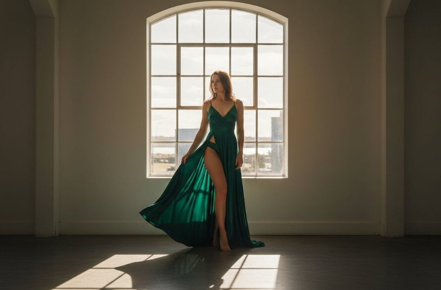 A powerful and intimate portrait from an empowering boudoir photography North Geelong experience, showing a woman confidently embracing her reflection in a beautifully lit room, symbolizing self-acceptance and strength.