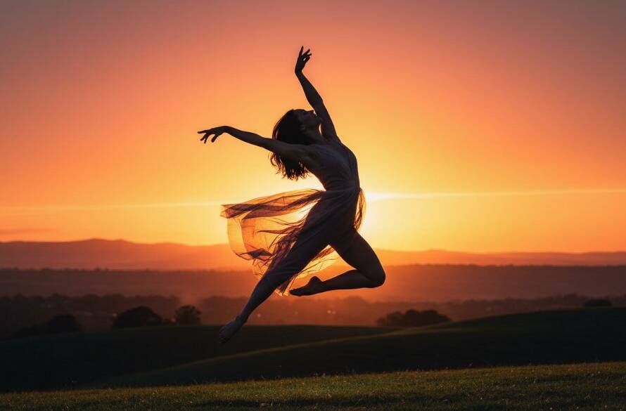 An expressive dance photography Croydon Victoria shot featuring a female dancer in mid-air, silhouetted against a golden hour sunset over Croydon's hills, capturing a moment of powerful artistic flight with dramatic lighting.