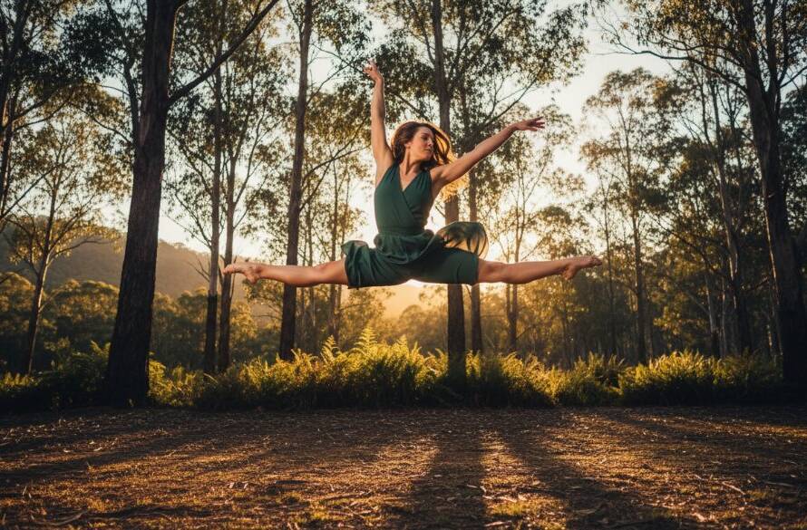 A female contemporary dancer in mid-air, performing an acrobatic leap against the dramatic, dappled light of an autumn evening in Ferntree Gully, showcasing dynamic dance photography with immense power and grace.