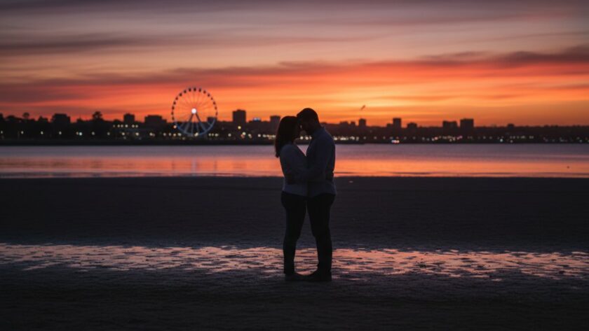 A breathtaking fine art photograph capturing a couple silhouetted against a dramatic sunset over Corio Bay in Geelong, embodying Geelong fine art photography capturing coastal serenity with powerful, professional colour grading.
