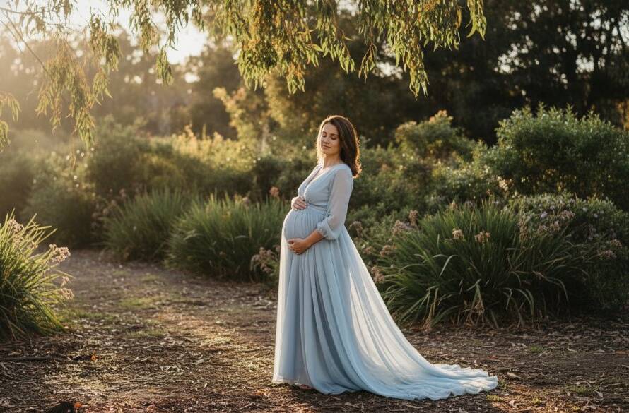 A radiant expectant mother in Knoxfield, bathed in golden hour light, cradling her bump, symbolising the glowing journey of motherhood. This stunning image captures the essence of Knoxfield maternity photography capturing your glowing journey, with a serene Australian bushland backdrop.