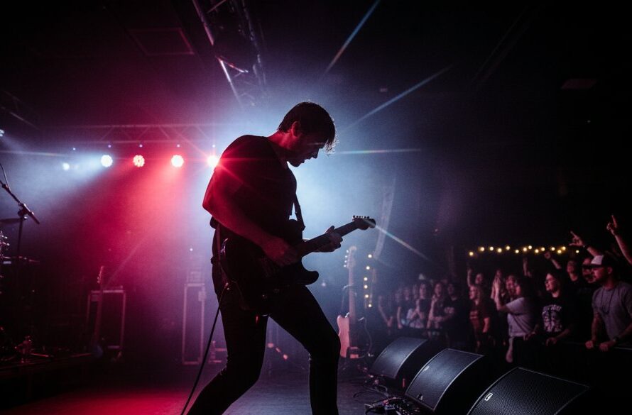 A dynamic and colour-rich photograph capturing an epic moment of a lead singer performing on stage under dramatic spotlights during Lucas Victoria concert photography epic moments, audience blurred in the background, conveying intense energy and passion.