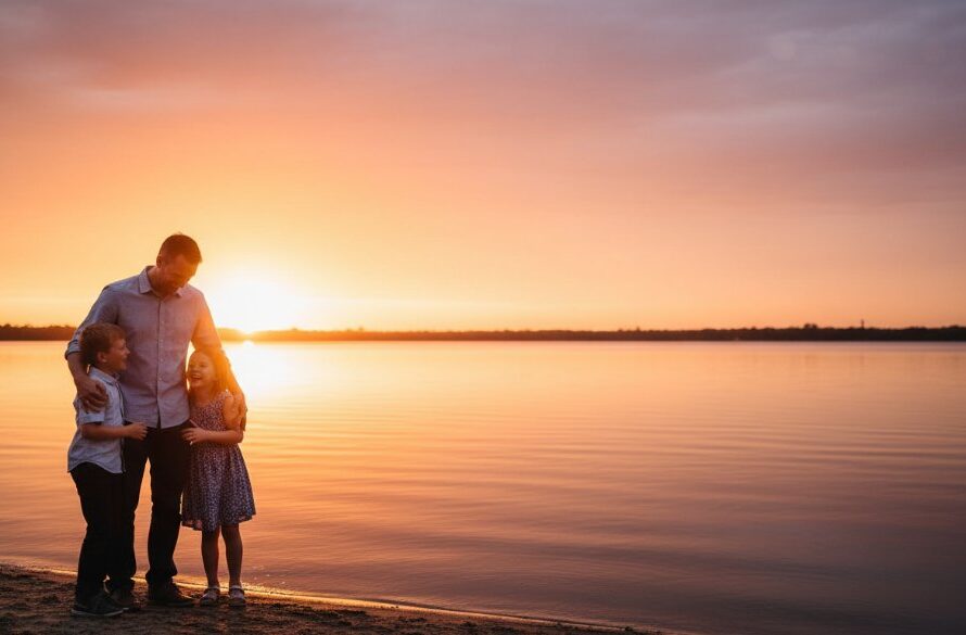 An epic moment of a joyful family embracing amidst the golden afternoon light at Lake Narracan, Morwell, perfectly capturing Morwell Victoria family photography heartfelt moments with professional warmth and genuine emotion.