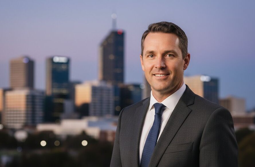 Dramatic, professionally colour-graded photograph of a successful business professional in Shepparton, confidently presenting their brand. The professional corporate headshots Shepparton businesses need are captured with modern elegance.