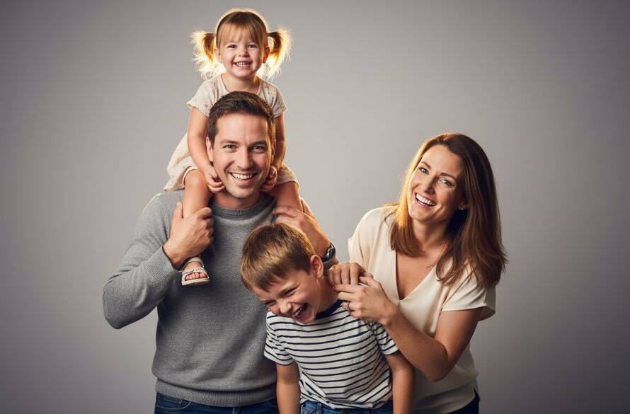 A heartwarming, professionally lit studio photograph in Croydon South, showing a family's joyous laughter frozen in time, exemplifying professional studio photography Croydon South capturing cherished family moments.