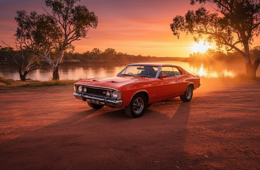 Dramatic Red Cliffs sunset automotive photography capturing classic cars, featuring a vintage Ford Falcon GT bathed in golden light near the iconic Murray River bank at dusk, with rich colours and a cinematic feel.