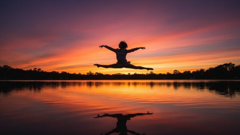 A contemporary dancer frozen mid-air in a powerful, dynamic leap against the backdrop of a Sale sunset, showcasing Sale Victoria dynamic dance photography with dramatic flair and professional artistry.