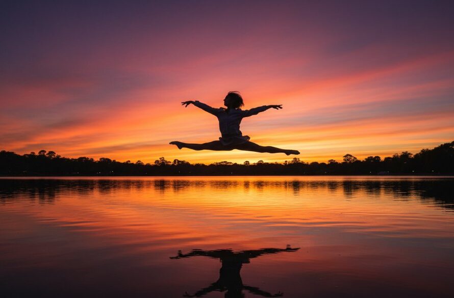 A contemporary dancer frozen mid-air in a powerful, dynamic leap against the backdrop of a Sale sunset, showcasing Sale Victoria dynamic dance photography with dramatic flair and professional artistry.