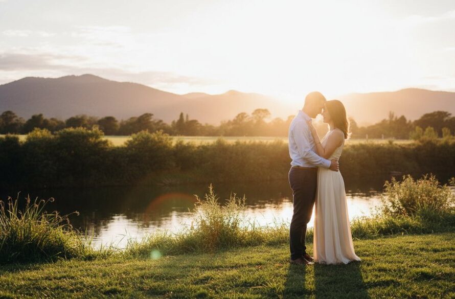 A couple embraces tenderly at sunset, framed by the majestic Victorian Alps, showcasing beautiful Wangaratta pre-wedding photography scenic Victorian Alps moments with golden light.