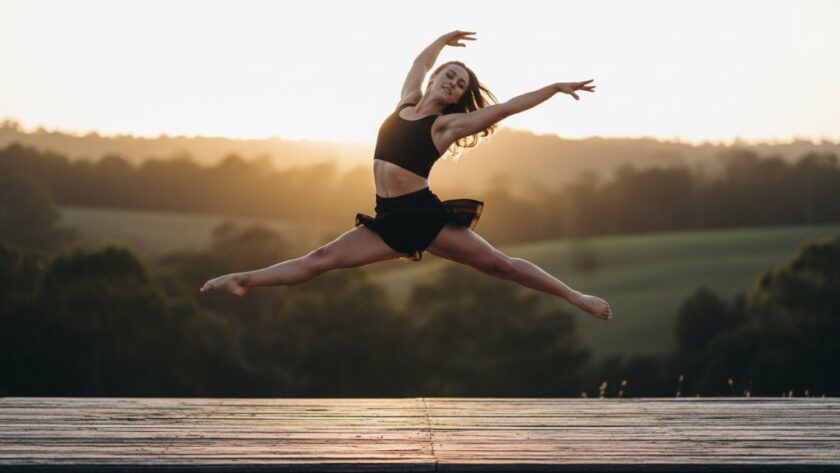 Dynamic full-body shot of a contemporary dancer mid-leap, silhouetted against a golden Warragul sunset, capturing the raw emotion and movement inherent in Warragul contemporary dance photography emotive storytelling.
